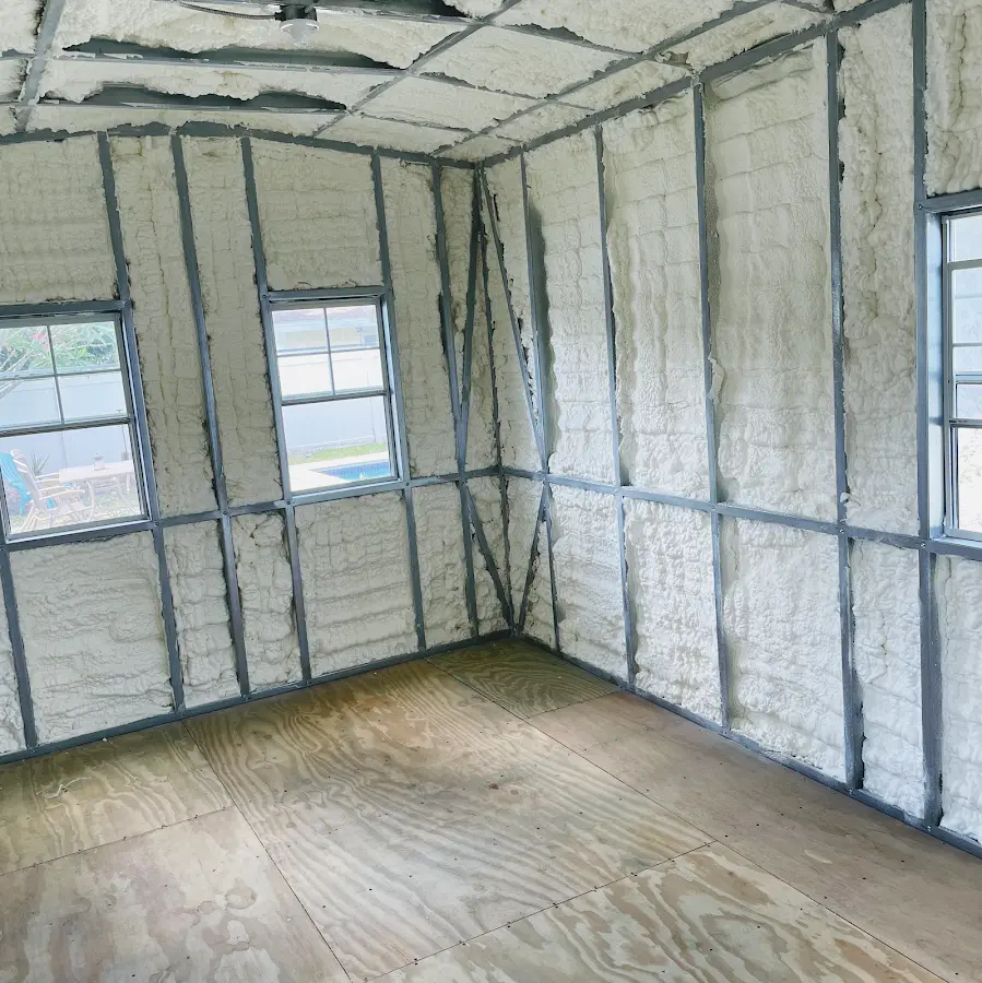 Closed-cell spray foam insulation applied to wall cavities in a residential project in Linden